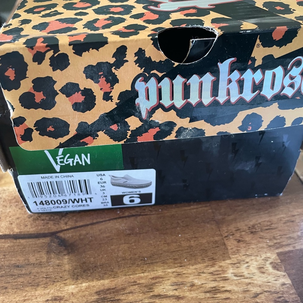 Size 6 slip on Vans by Punkrose